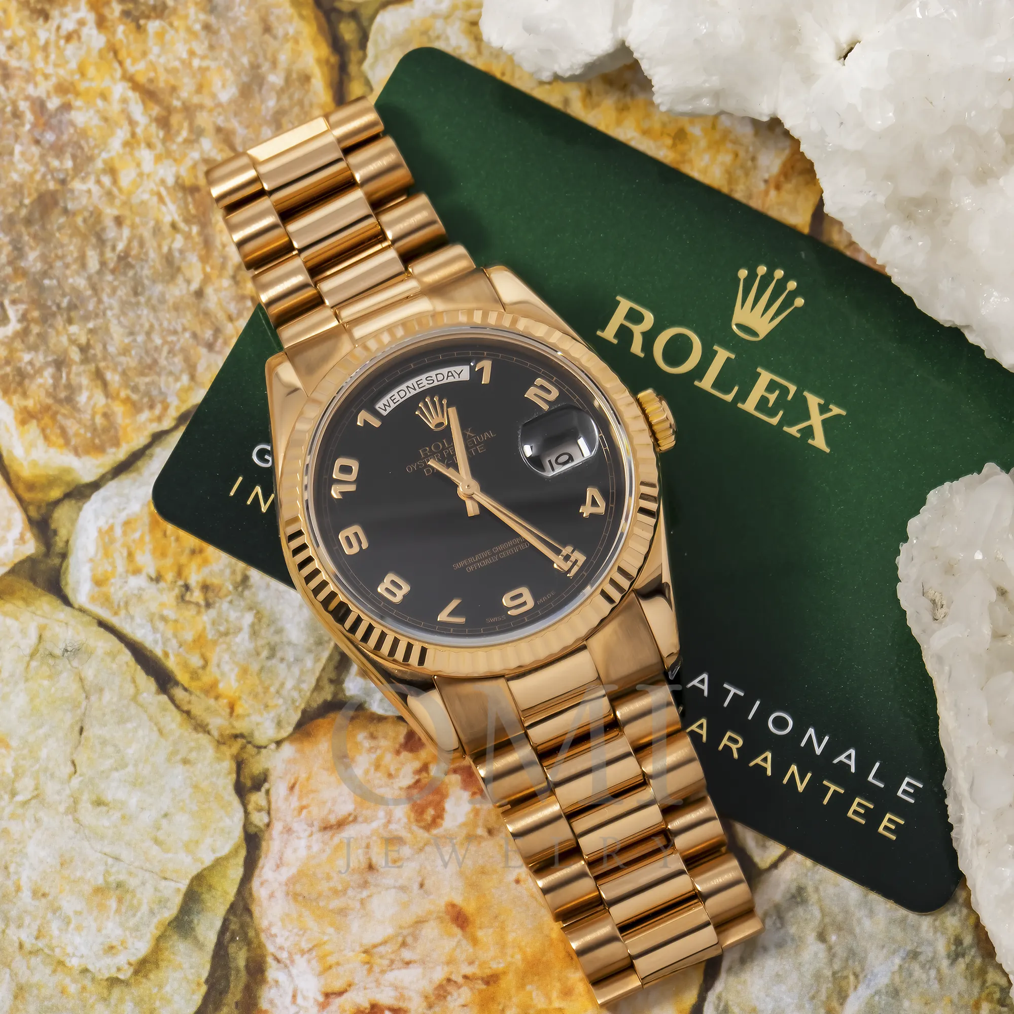 18K ROSE GOLD ROLEX DAY-DATE 118235 36MM WITH BLACK NUMERALS DIAL